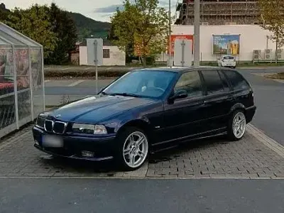 Gebraucht BMW 318 M Sport 115 PS (84 kW) 1996 Violet Kombi