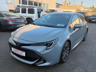 Gebraucht Toyota Corolla Hybrid Team 98 PS (72 kW) 2023 Cement grey/manhattan grey Limousine