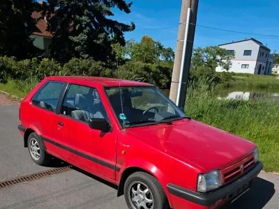 Gebraucht Nissan Micra 54 PS (39 kW) 1992 Rot Kleinwagen