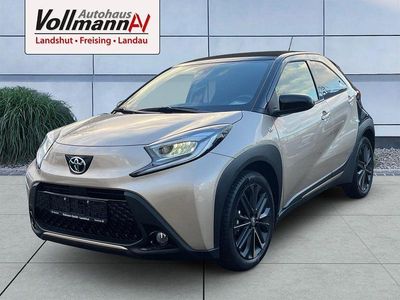 Gebraucht Toyota Aygo X x-style 72 PS (52 kW) 2024 Ginger beige metallic/ night sky black SUV