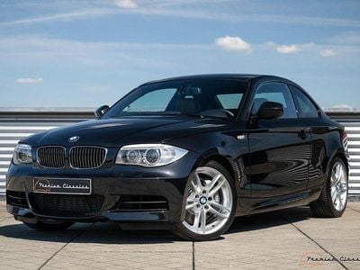 Begagnad BMW 135 Executive 306 HK (225 kW) 2012 Svart Halvkombi
