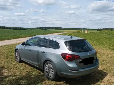 Używany Opel Astra 140 KM (102 kW) 2011 Srebrny Kombi