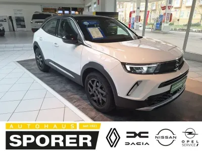 Gebraucht Opel Mokka-e Elegance 100 kW (136 PS) 2023 Arktis weiß SUV