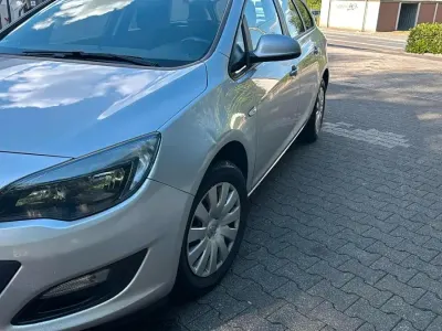 Gebraucht Opel Astra 136 PS (100 kW) 2014 Silber Kombi
