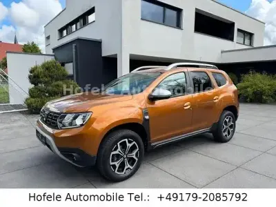 Używany Dacia Duster Prestige 125 KM (91 kW) 2018 Pomarańczowy SUV