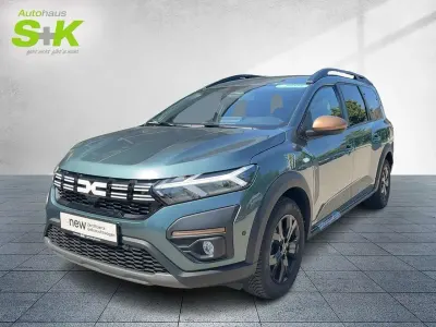 Gebraucht Dacia Jogger Extreme 110 PS (80 kW) 2024 Zedergrün metallic (grün) Van / Kleinbus