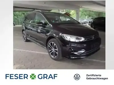 Gebraucht VW Touran Highline 150 PS (110 kW) 2024 Deep black perleffekt Van / Kleinbus