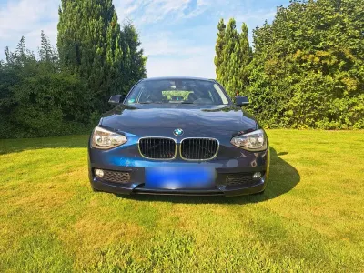 Używany BMW 116 Urban Line 136 KM (100 kW) 2014 Niebieski Hatchback