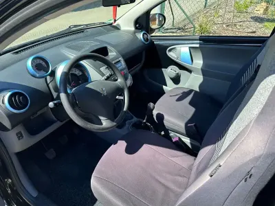 Gebraucht Peugeot 107 Filou 68 PS (50 kW) 2010 Schwarz Kleinwagen
