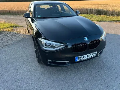 Gebraucht BMW 118 Sport Line 143 PS (105 kW) 2011 Schwarz Kleinwagen