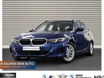 Second-hand BMW 330e Shadowline 292 CP (214 kW) 2023 Albastru Break