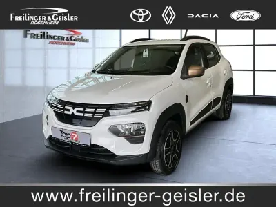 Gebraucht Dacia Spring Extreme 47 kW (65 PS) 2023 Polarweiss (metallic) Kleinwagen