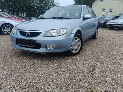 Używany Mazda 323 95 KM (69 kW) 2003 Niebieski Sedan/Limuzyna
