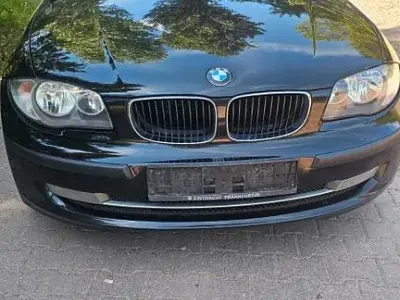 Gebraucht BMW 116 122 PS (89 kW) 2010 Schwarz Kleinwagen