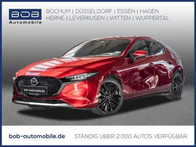 Używany Mazda 3 Exclusive-Line 186 KM (136 kW) 2024 Czerwony Sedan/Limuzyna