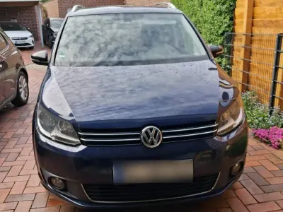 Używany VW Touran Style 140 KM (102 kW) 2012 Niebieski Minivan