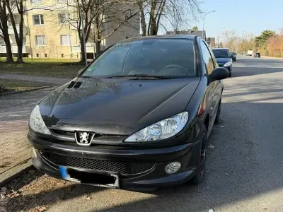 Używany Peugeot 206 75 KM (55 kW) 2006 Czarny Sedan/Limuzyna