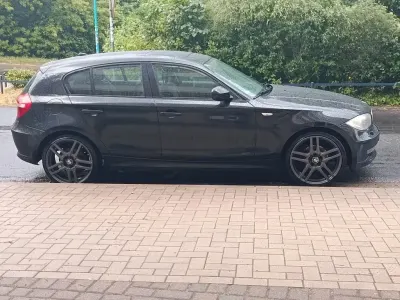 Gebraucht BMW 116 Sport Line 122 PS (89 kW) 2011 Schwarz Kleinwagen