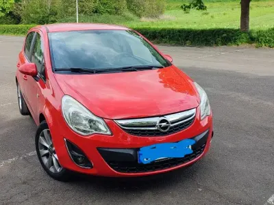 Gebraucht Opel Corsa Innovation 87 PS (63 kW) 2012 Rot Kleinwagen