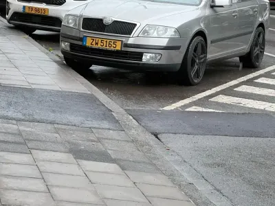 Używany Skoda Octavia 104 KM (76 kW) 2006 Szary Sedan/Limuzyna