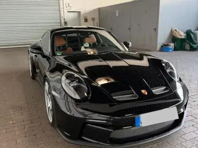 Gebraucht Porsche 992 525 PS (386 kW) 2024 Schwarz Coupé