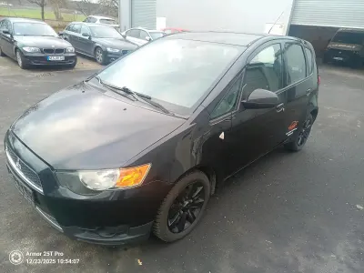 Occasion Mitsubishi Colt 95 PK (69 kW) 2012 Zwart Hatchback