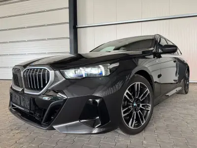 Gebraucht BMW 520 M Sport 197 PS (144 kW) 2025 Grau Kombi