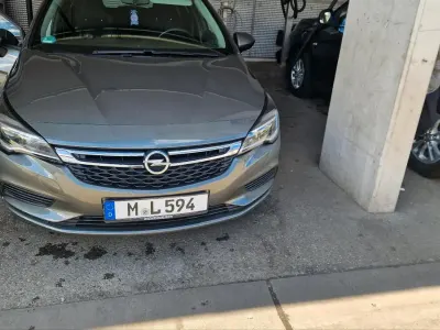 Używany Opel Astra 105 KM (77 kW) 2018 Szary Sedan/Limuzyna