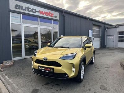 Warm gold metallic (metallic) Gebraucht 2021 Toyota Yaris Hybrid Comfort SUV | 22.980 € (Fairer Preis)
