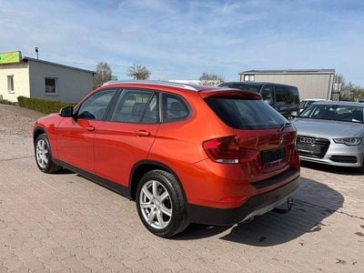 Second-hand BMW X1 Sport Line 143 CP (105 kW) 2013 Portocaliu SUV