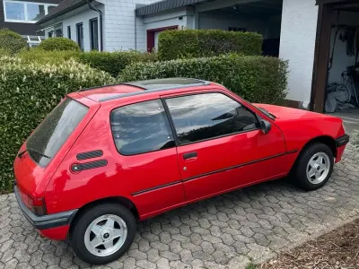 Gebraucht Peugeot 205 75 PS (55 kW) 1992 Rot Kleinwagen