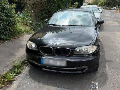 Gebraucht BMW 116 122 PS (89 kW) 2010 Schwarz Kleinwagen