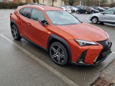 Second-hand Lexus UX 250h E-FOUR F-Sport 183 CP (134 kW) 2021 Portocaliu SUV
