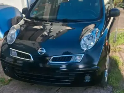 Gebraucht Nissan Micra 65 PS (47 kW) 2010 Schwarz Kleinwagen