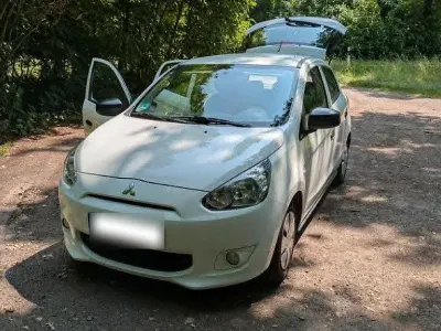 Gebraucht Mitsubishi Space Star 71 PS (52 kW) 2015 Weiß Kleinwagen