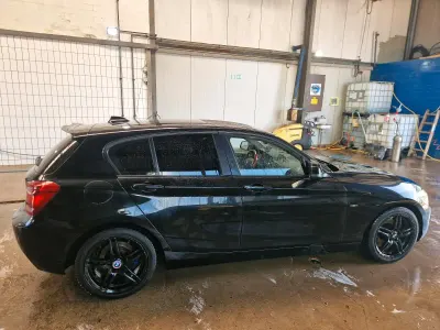 Gebraucht BMW 118 Sport Line 170 PS (125 kW) 2012 Schwarz Kleinwagen