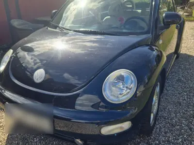 Gebraucht VW New Beetle 85 PS (62 kW) 2000 Schwarz Kleinwagen