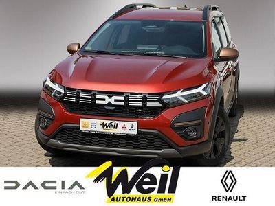 Gebraucht Dacia Jogger Extreme 94 PS (69 kW) 2024 Braun (terracottabraun metallic (braun)) Van / Kleinbus