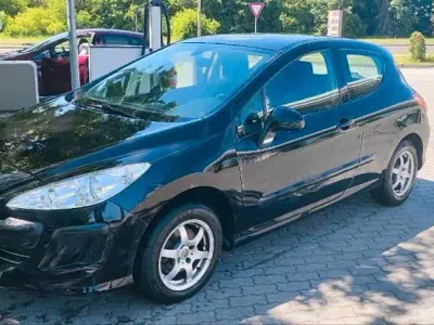 Gebraucht Peugeot 308 98 PS (72 kW) 2010 Schwarz Kleinwagen