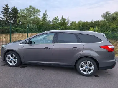 Gebraucht Ford Focus 101 PS (74 kW) 2012 Braun Kombi