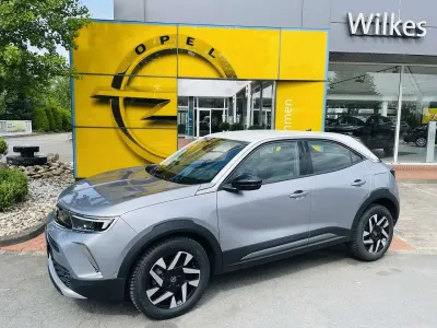 Gebraucht Opel Mokka Elegance 101 PS (74 kW) 2021 Kontrast grau/quarz silber SUV