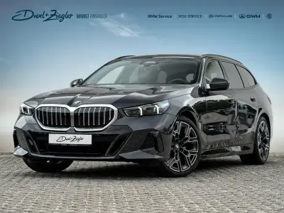 Gebraucht BMW 520 M Sport 197 PS (144 kW) 2025 Sophistograu brillanteffekt metallic Kombi