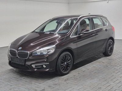 Sparklingbraunmet. Gebraucht 2015 BMW 218 Active Tourer Van / Kleinbus | 15.380 € (Teuer)