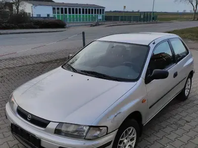 Gebraucht Mazda 323 73 PS (53 kW) 1998 Silber Limousine