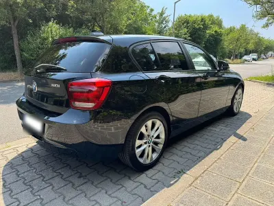 Gebraucht BMW 116 136 PS (100 kW) 2012 Schwarz Kleinwagen
