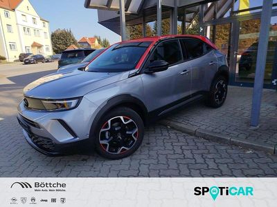 Gebraucht Opel Mokka GS Line 131 PS (96 kW) 2022 Kontrast grau/quarz silber SUV