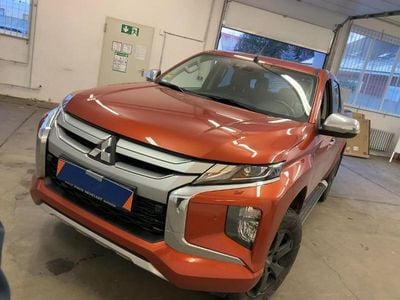 Gebraucht Mitsubishi L200 Top 150 PS (110 kW) 2022 Zirkonorange (metallic) Abholung