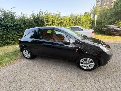 Gebraucht Opel Corsa 86 PS (63 kW) 2011 Schwarz Kleinwagen
