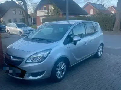 Second-hand Opel Meriva 140 CP (102 kW) 2015 Argintiu Monovolum