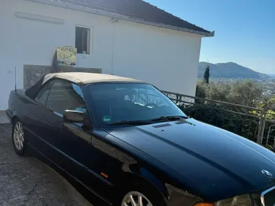 Gebraucht BMW 318 Cabriolet 115 PS (84 kW) 1997 Schwarz Cabrio